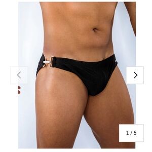 Vaquita Black swim brief with golden clip